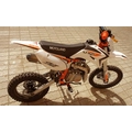 Питбайк XR125 Motoland (колеса 17/14, фара, стартер, бело-оранжевый)